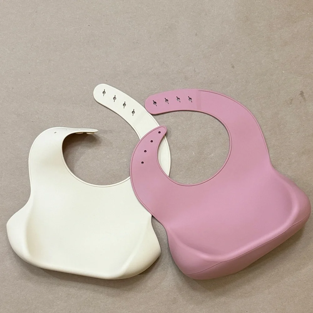 Cream and Pink Silicone Baby Bibs
